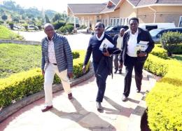 Kalonzo Musyoka with Kimani Ichung'wah and Eugene Wamalwa in Naivasha.